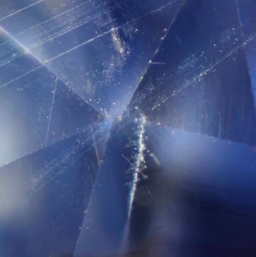 Figure 4: Dust tracks in one of the new 'Kashmir-like' sapphires from Madagascar. Photo: M.S. Krzemnicki, SSEF.