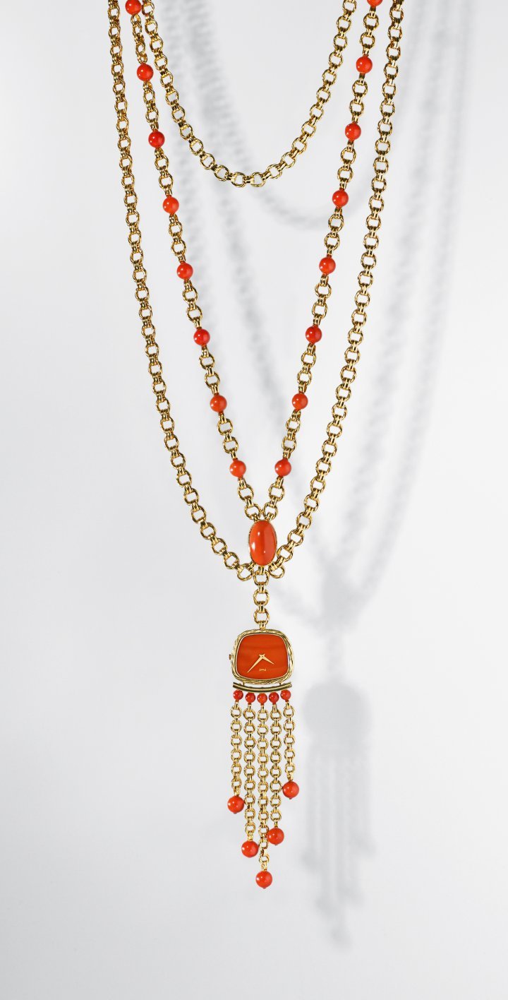 Piaget Swinging Sautoir watch, yellow gold, coral beads and dial. Manufacture 9P ultra-thin hand-wound movement. 1970. Piaget Private Collection.
