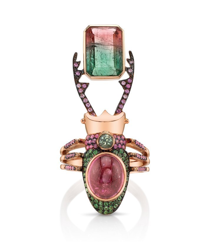 The Pushpavati Ring. A stag beetle made in 18k yellow gold with a watermelon tourmaline, pink tourmaline and sparkly pink and green sapphires