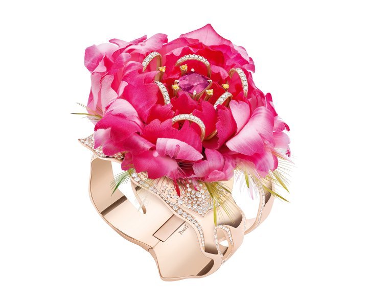 From Piaget's Shapes of Extraleganza High Jewellery Collection, a cuff reinterprets the Yves Piaget Rose in feathers, a collaboration with Nelly Saunier